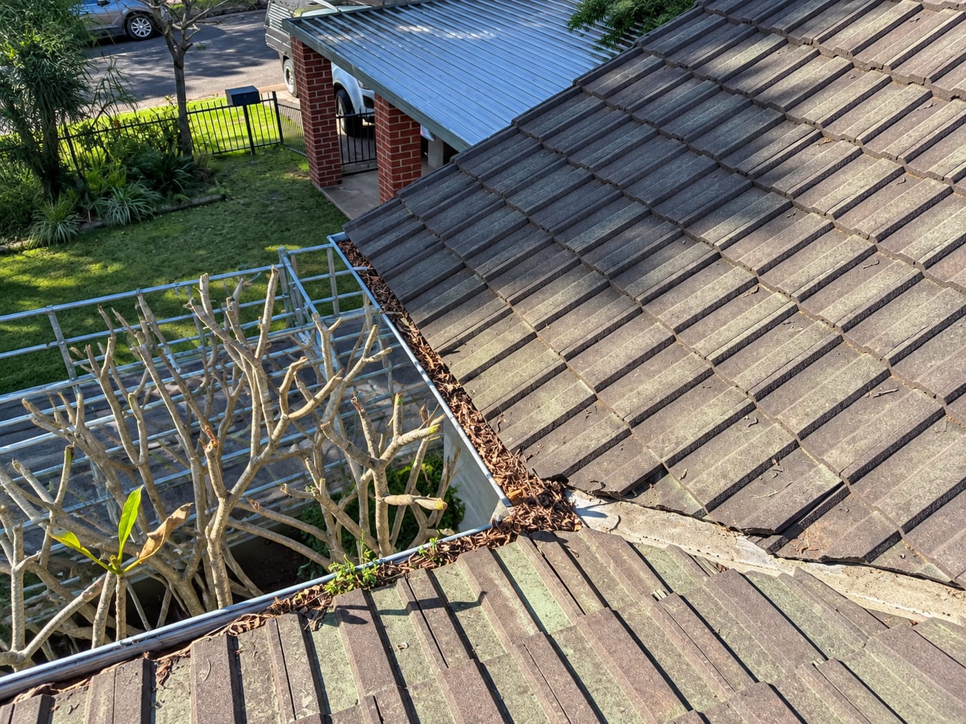 Roof valley maintenance inspection